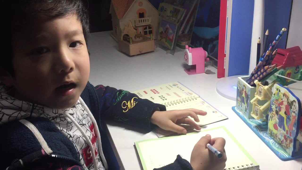 大A班时悦洋3月16日作业二：田字格写数字1和2