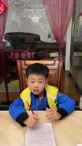 2023级B班20220416吴艺轩闯关练习-数字描红“20、21”.MOV