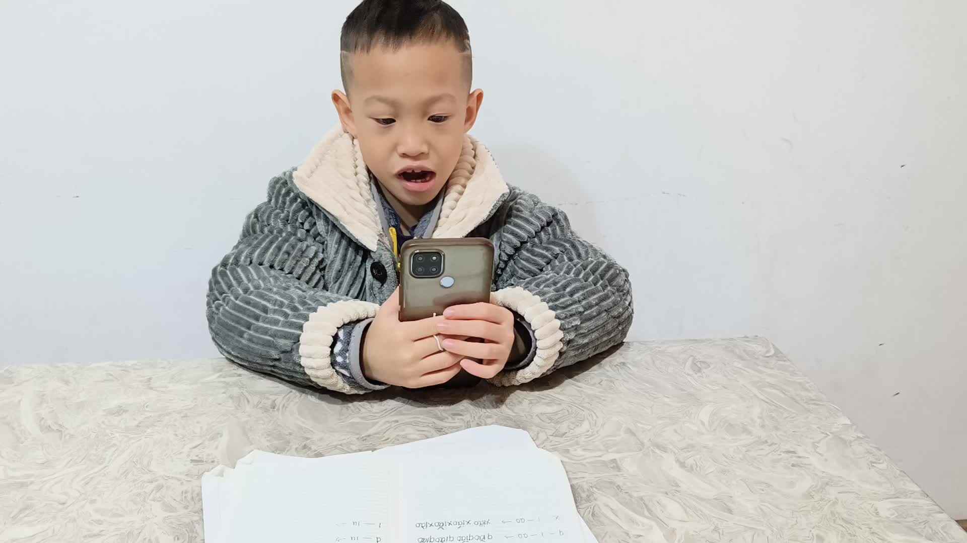 2023级学前B班张梓乐20221229复习ou  iu 的发音儿歌，音节拼读，书写
