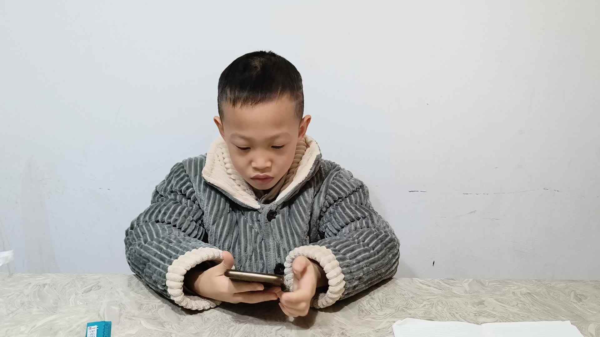 2023级学前B班张梓乐20230105复习前鼻韵母in un 的发音儿歌，音节拼读，书写